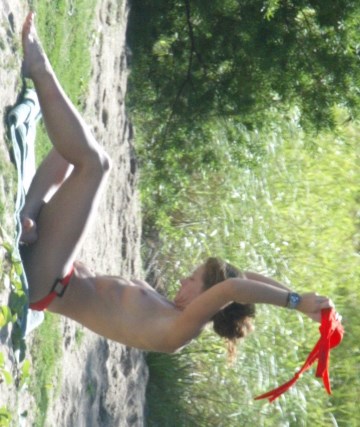 Rebecca Gayheart - Topless sunbathing