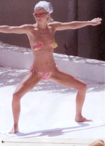 Geri Halliwell - Topless sunbathing