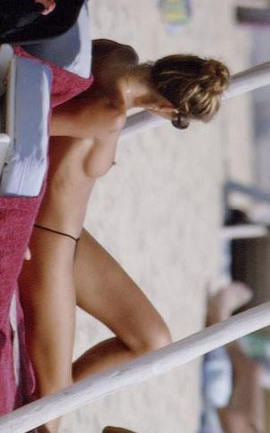 Elle Macpherson - Topless sunbathing