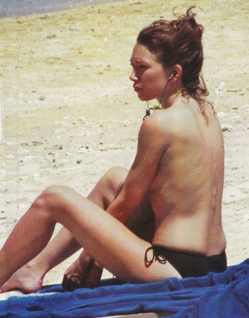 Laura Smet - Topless sunbathing
