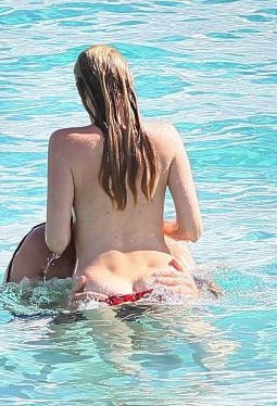 Lara Stone - Topless swimming