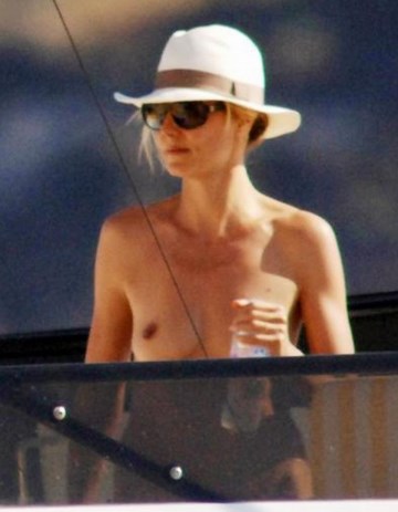 Heidi Klum - topless on a yacht