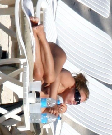 Billie Piper - Topless sunbathing