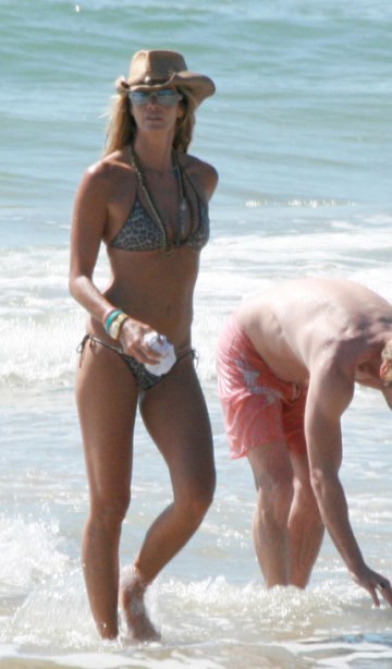 Elle Macpherson - bikini at the beach