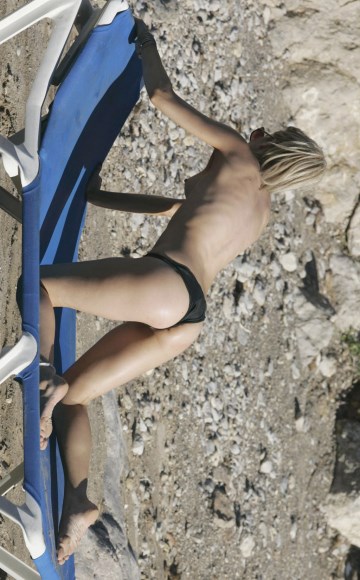 Kate Lawler - Topless sunbathing