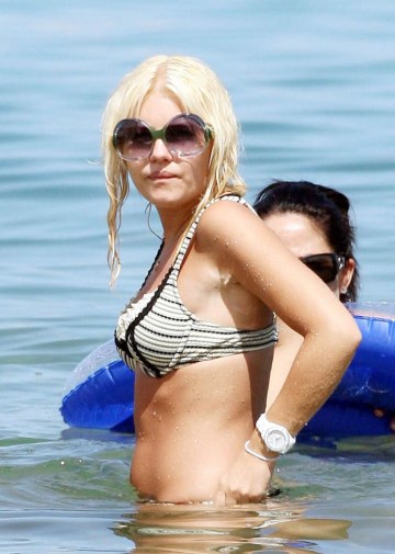 Elisha Cuthbert - bikini at the beach