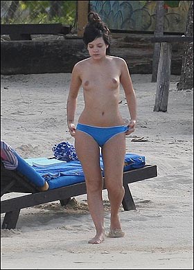 Lily Allen - Topless sunbathing