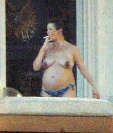 Catherine Zeta-Jones - Topless sunbathing