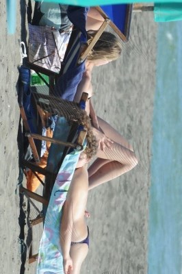 Vanessa Hessler - Topless sunbathing