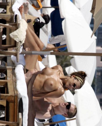 Oksana Andersson - Topless sunbathing