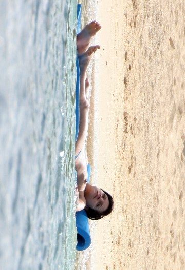 Lily Allen - Topless sunbathing