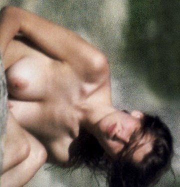 Laetitia Casta - Topless sunbathing