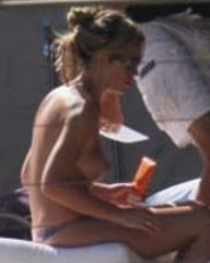 Abigail Clancy - Topless sunbathing