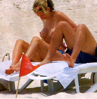 Natalie Appleton - Topless sunbathing