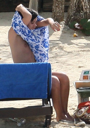 Lily Allen - Topless sunbathing