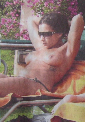 Nadja Benaissa - Topless sunbathing
