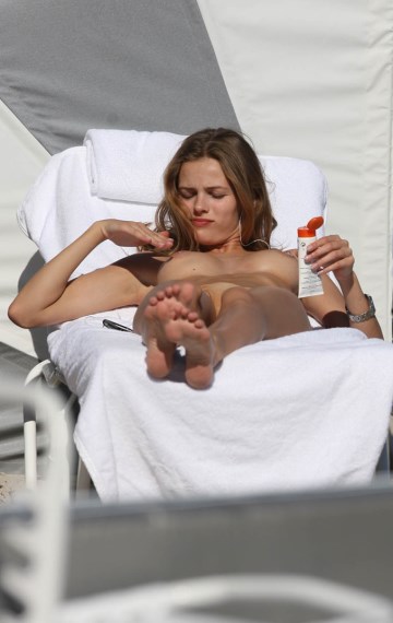 Edita Vilkeviciute - Topless sunbathing