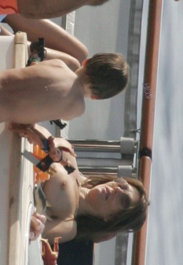 Elizabeth Hurley - Topless sunbathing