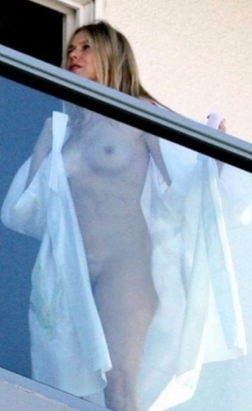 Naomi Watts - nude on a balcony