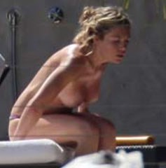 Abigail Clancy - Topless sunbathing