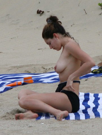 Kelly Brook - Topless sunbathing