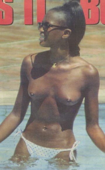 Naomi Campbell - Topless sunbathing