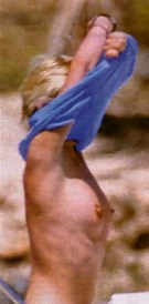 Zoë Ball - Topless sunbathing