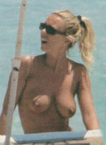 Paola Perego - Topless sunbathing