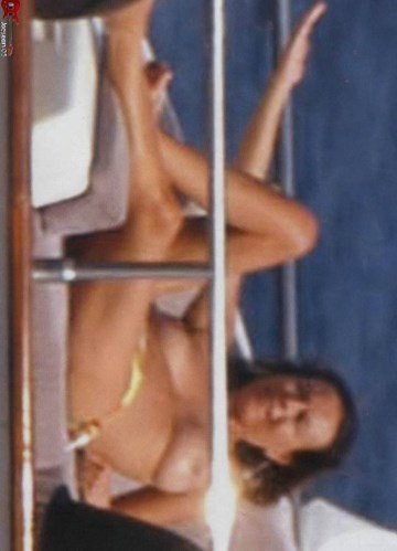 Paola Perego - topless on a yacht