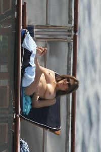 Elizabeth Hurley - Topless sunbathing