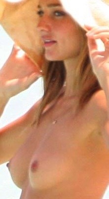 Miranda Kerr - topless at the beach