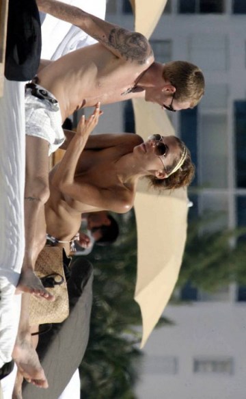 Oksana Andersson - Topless sunbathing