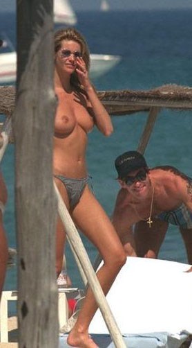 Elle Macpherson - Topless sunbathing