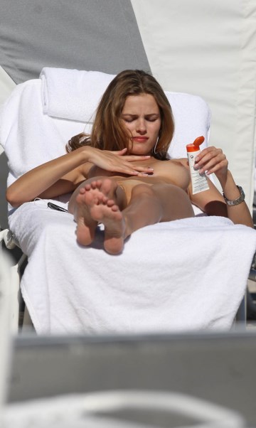 Edita Vilkeviciute - Topless sunbathing