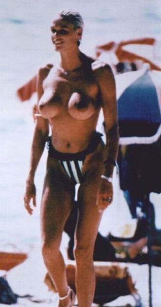 Brigitte Nielsen - topless at the beach