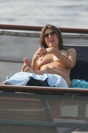 Elizabeth Hurley - Topless sunbathing