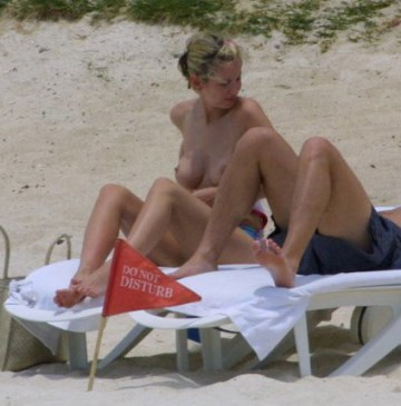 Natalie Appleton - Topless sunbathing