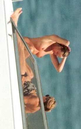 Elle Macpherson - Topless on a boat near St. Tropez