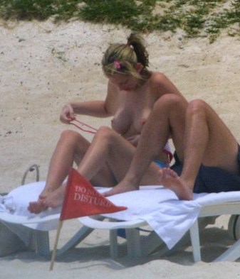 Natalie Appleton - Topless sunbathing